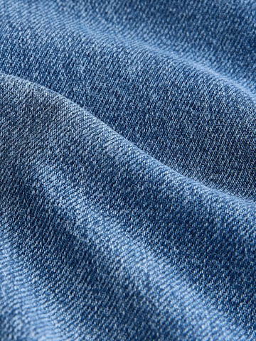 Loosefit Jeans di self. in blu