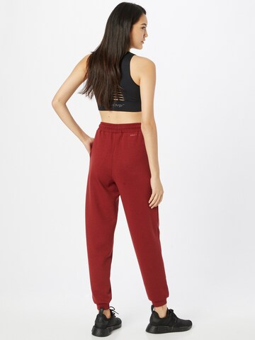 Effilé Pantalon de sport ONLY PLAY en rouge