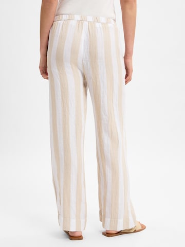 Ipuri Flared Pleat-front trousers in Beige