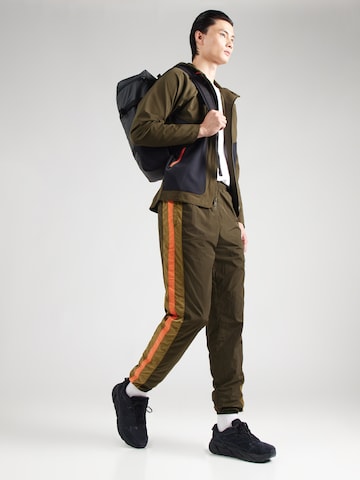 UNDER ARMOUR Дънки Tapered Leg Спортен панталон в зелено
