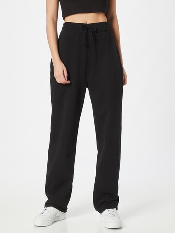 ABOUT YOU Limited Loose fit Trousers 'Rico' in Black: front