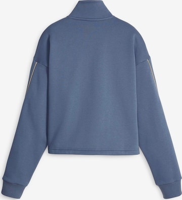 PUMA Sportsweatshirt 'ESS+ MINIMAL' i blå