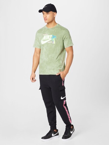 Effilé Pantalon cargo Nike Sportswear en noir