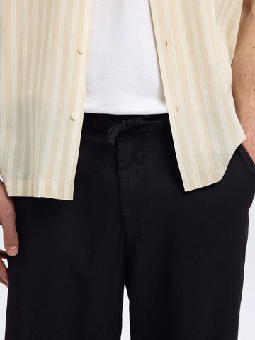 SELECTED HOMME Loose fit Trousers 'SLHMagnus' in Black