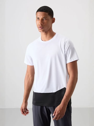 T-Shirt fonctionnel Tommy Life en blanc