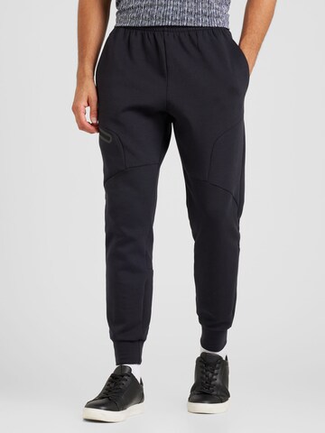 Effilé Pantalon de sport 'Unstoppable' UNDER ARMOUR en noir : devant