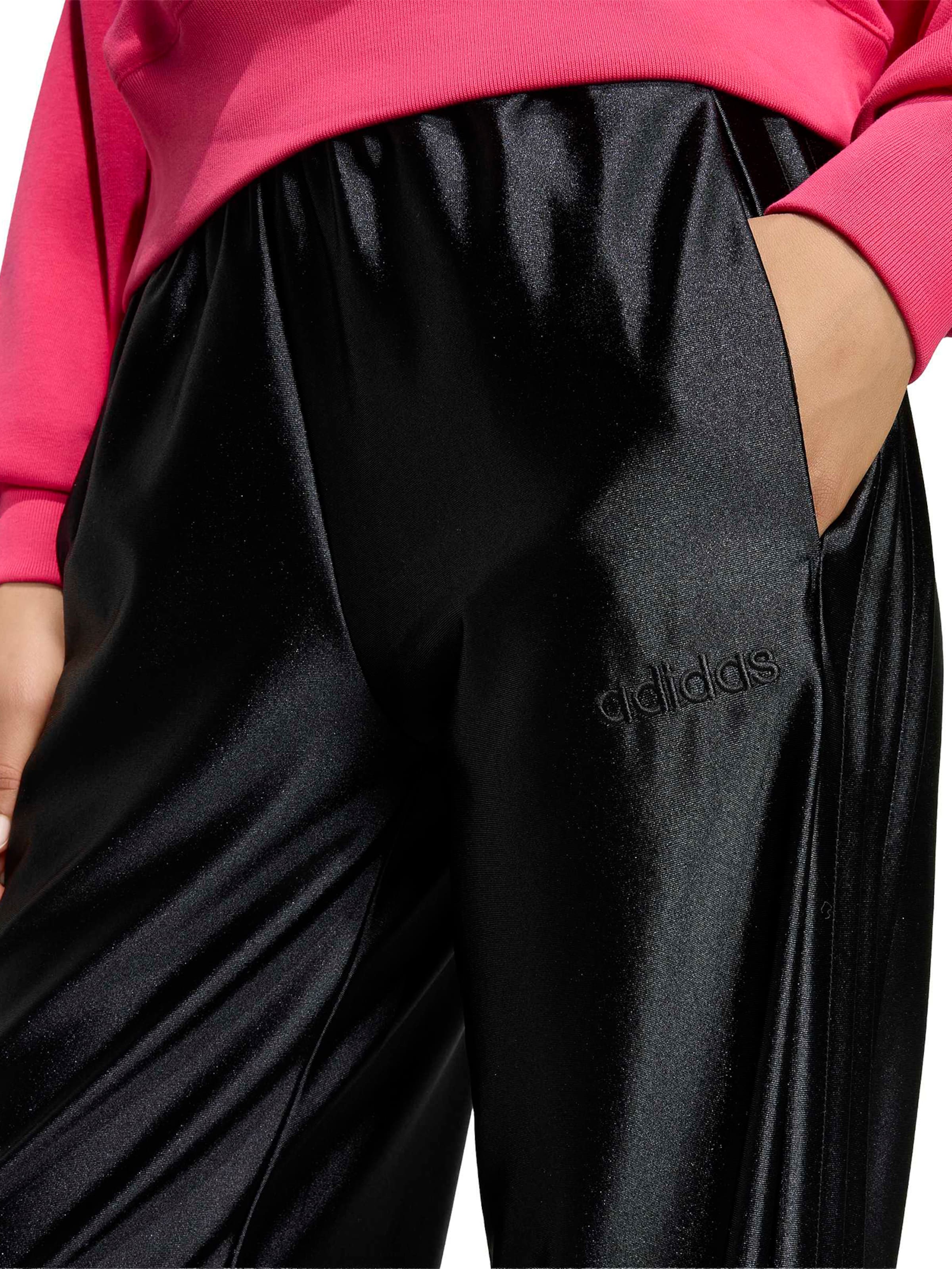 Loosefit Pantaloni sportivi di ADIDAS SPORTSWEAR in nero