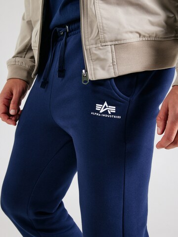 ALPHA INDUSTRIES Tapered Nadrág - kék