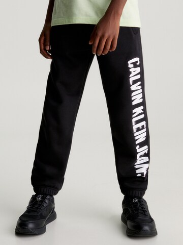 Calvin Klein Jeans Loose fit Pants in Black: front