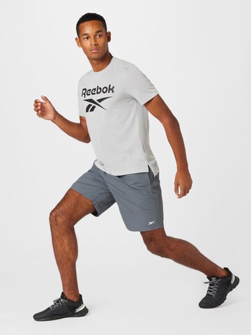 Reebok Normalny krój Spodnie sportowe w kolorze szary