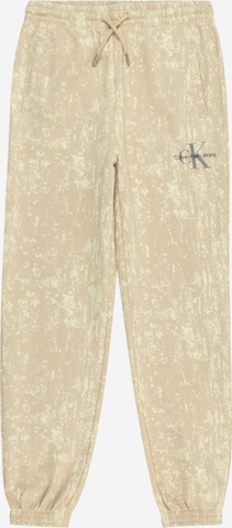 Calvin Klein Jeans Tapered Housut värissä beige: edessä