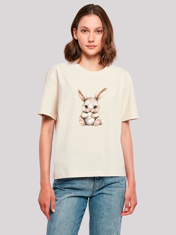 T-shirt 'Niedlicher Osterhase mit Ei' F4NT4STIC en beige : devant