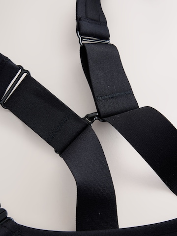 Bustino Reggiseno sportivo 'Zero Bounce' di Next in nero