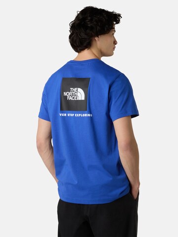 THE NORTH FACE - Camiseta en azul: frente