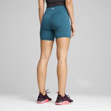 PUMA Skinny Sportbroek in Groen