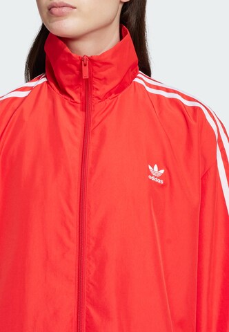 sarkans ADIDAS ORIGINALS Starpsezonu jaka 'Adilenium Season 3'