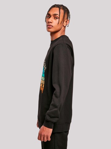 Sweat-shirt 'I Believe UFO Alien Sonnenuntergang' F4NT4STIC en noir