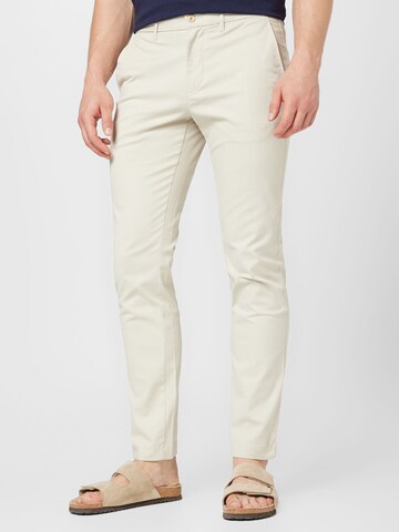TOMMY HILFIGER Slim fit Chino trousers 'DENTON' in Beige: front