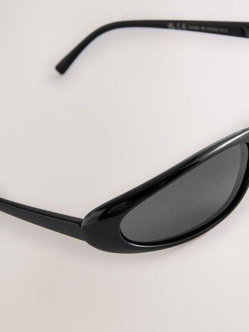 Lunettes de soleil Next en noir