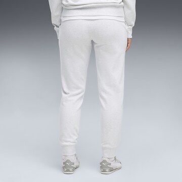 PUMA Tapered Sportbroek 'Essentials' in Wit