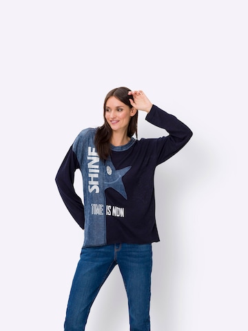 heine Pullover i blå: forside