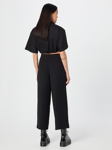 Wide leg Pantaloni di Warehouse in nero