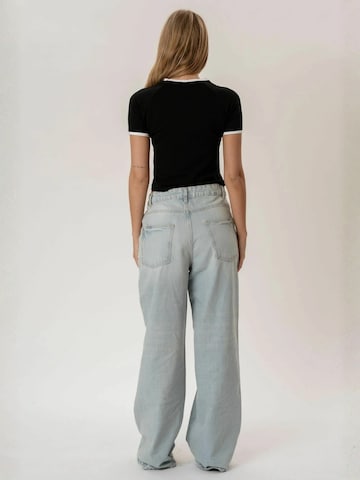 It's May Top ' Rosa ' in Black