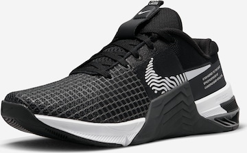 NIKE Athletic Shoes in Black: front