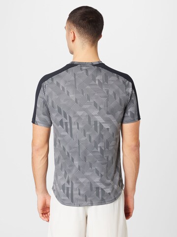 UNDER ARMOUR - Camiseta funcional 'Challenger' en gris