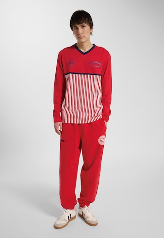 T-Shirt fonctionnel Hummel en rouge