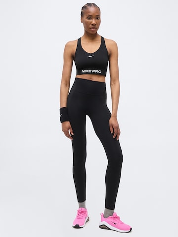 Bustino Reggiseno sportivo 'Pro' di NIKE in nero