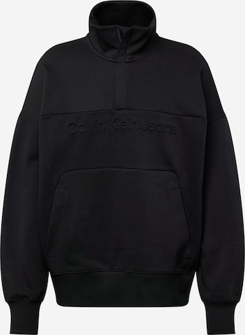 Sweat-shirt Calvin Klein Jeans en noir : devant