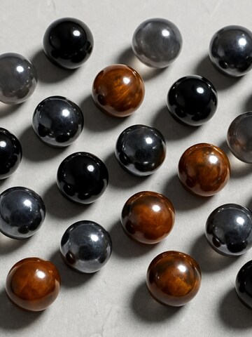 Bracelet 'HÄMATIT TIGERAUGE ONYX' UNIQAL en mélange de couleurs