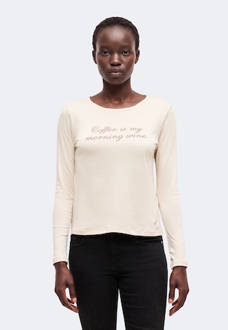 Tricou de la monari pe bej: față