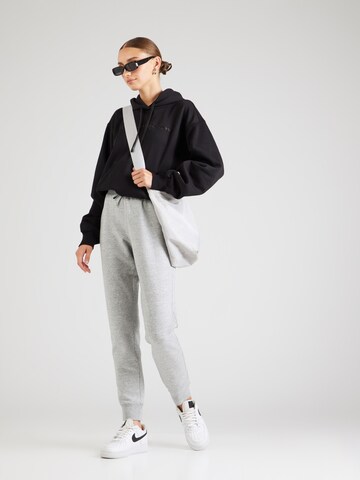 Champion Authentic Athletic Apparel - Tapered Calças em cinzento