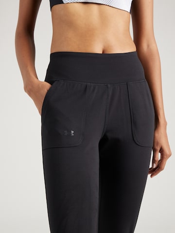 UNDER ARMOUR Tapered Workout Pants 'Motion' in Black