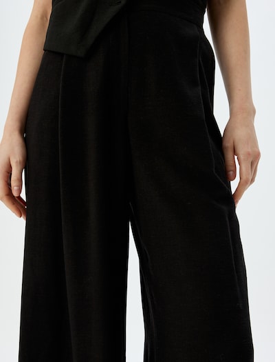 Koton Pleat-front trousers in 34/Regular in Black, Item view