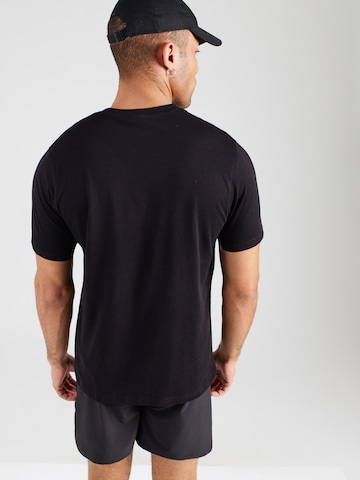 Reebok Funkční tričko 'BRUNO' – černá