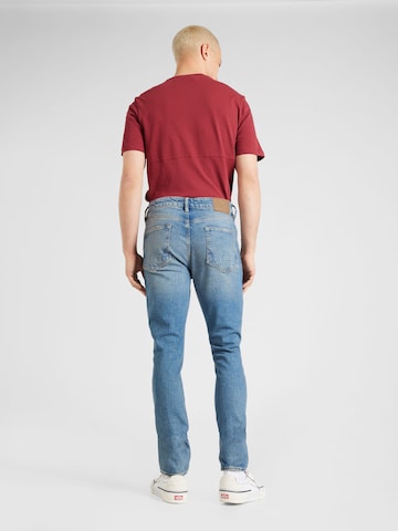 AllSaints Tapered Jeans in Blue