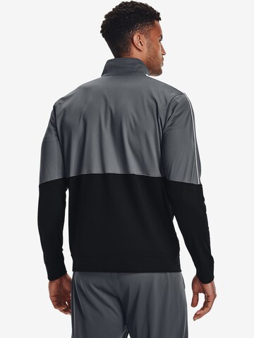 UNDER ARMOUR - Sudadera con cremallera deportiva en gris