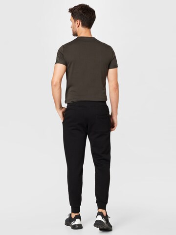 BJÖRN BORG Tapered Sports trousers in Black