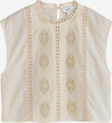 Next Pusero värissä beige: etupuoli