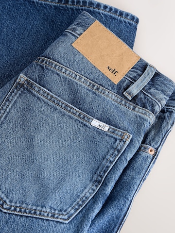 Loosefit Jeans di self. in blu