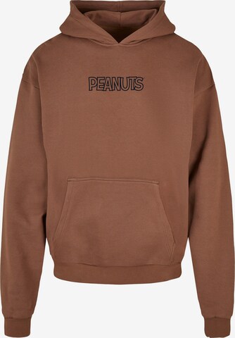 Merchcode Sweatshirt 'Peanuts - Peekaboo' in Bruin: voorkant