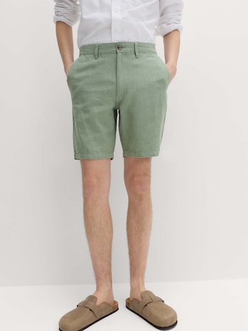 Regular Pantalon Marks & Spencer en vert : devant