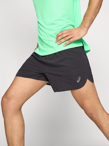 juoda ASICS Standartinis Sportinės kelnės 'METARUN 5IN'