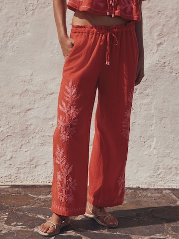Wide leg Pantaloni di Next in rosso: frontale