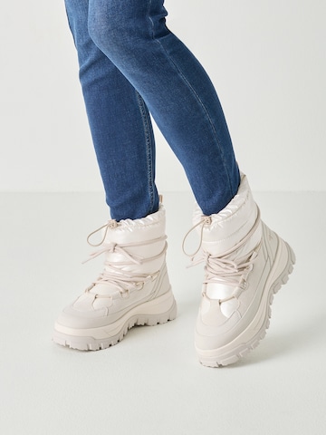 Tamaris - Botas de nieve en beige: frente