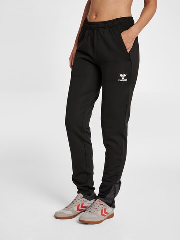 Coupe slim Pantalon de sport Hummel en noir : devant