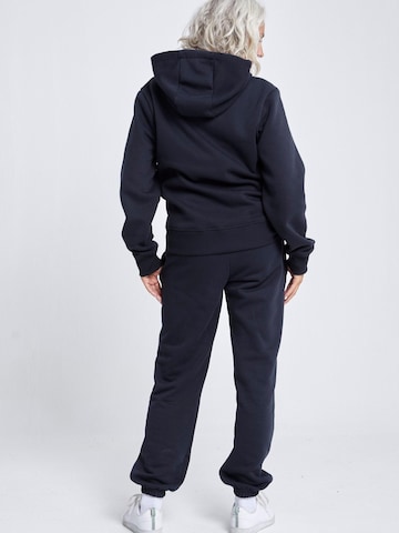 SPORTKIND - Loosefit Pantalón deportivo 'Jogging Pants' en negro
